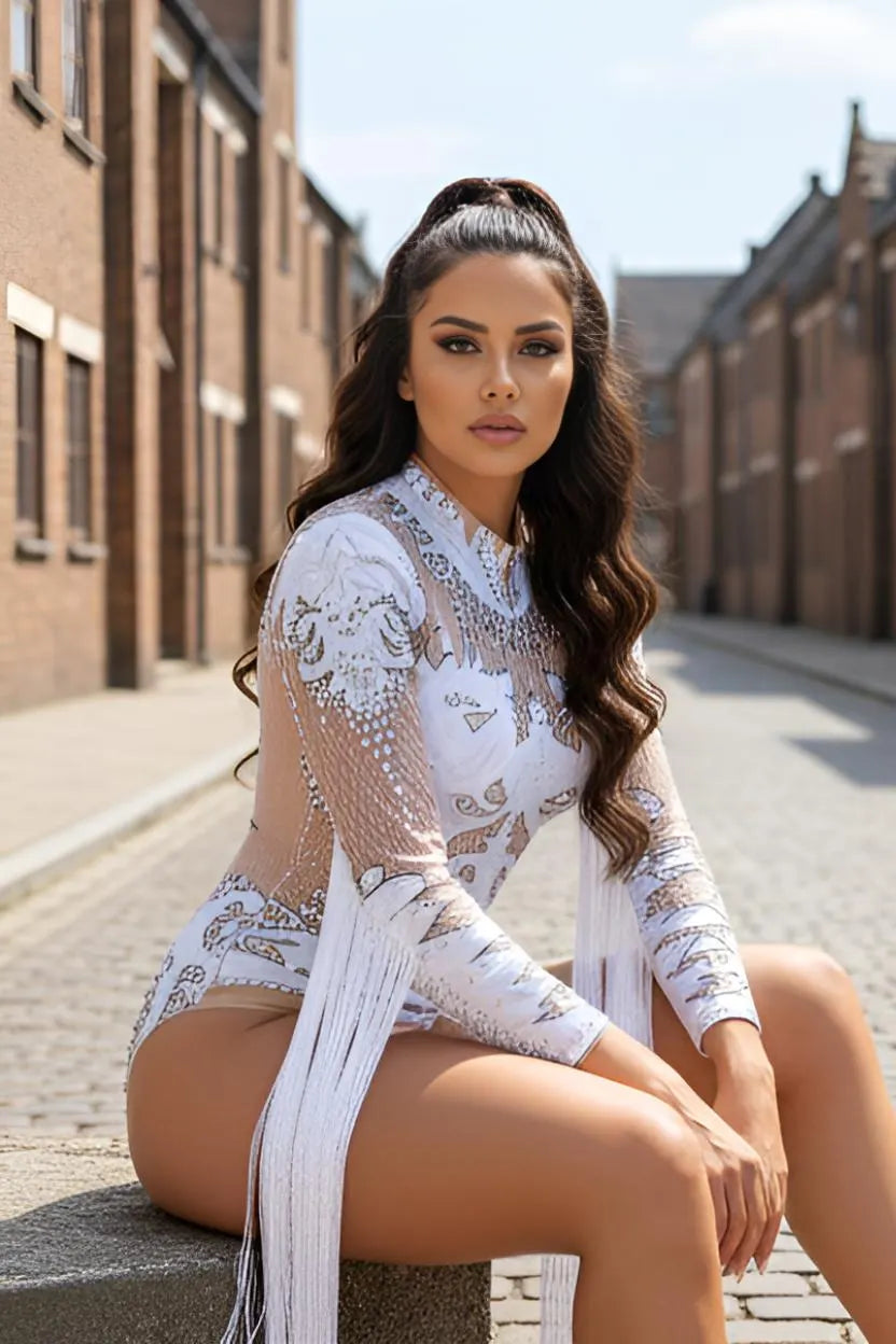 Festival bodysuit featuring white lace and flowing tassel details