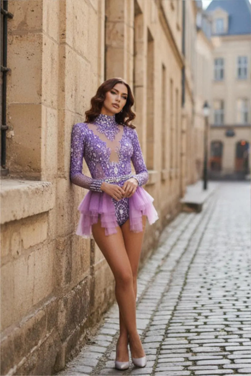 Purple Ruffle Rhinestone Bodysuit featuring a high-neck design and sparkling crystal embellishments.